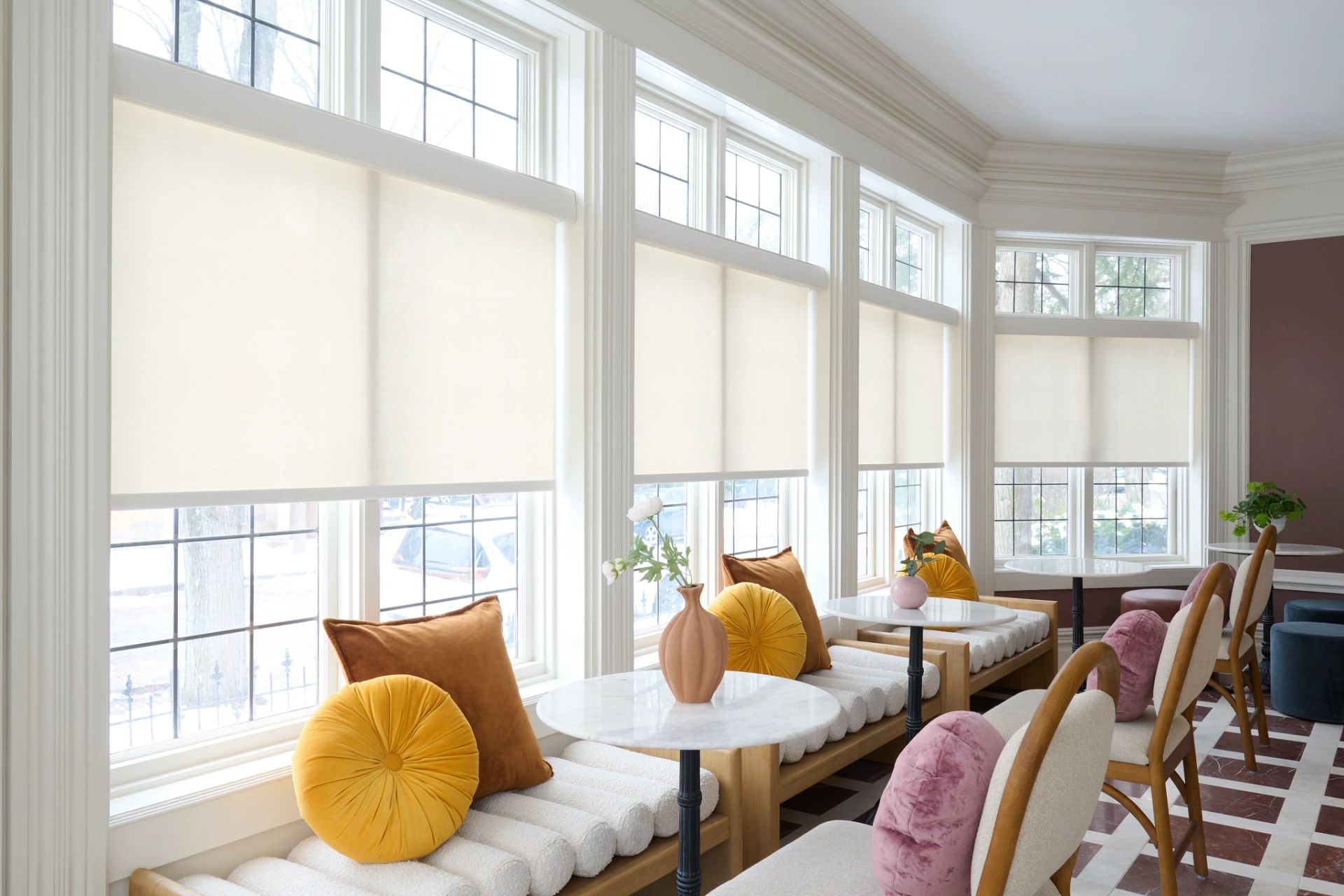 Graber's solar-shaded sunroom example illustrates view-preserving screening, not a guaranteed performance rating for every fabric.