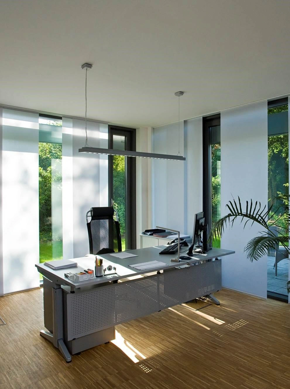 Elite Panel Track Shades supplier example. Panel count, fabric and stack configuration are selected separately.