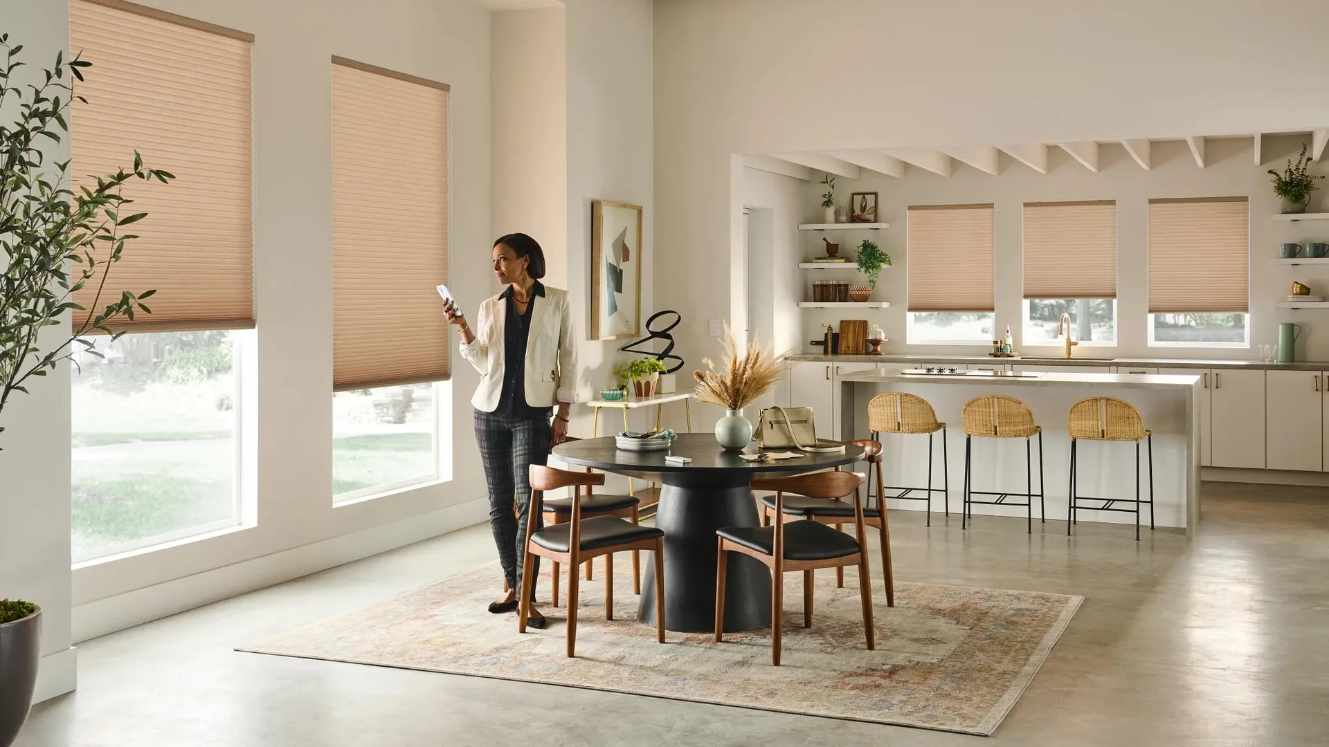 Alta honeycomb shades shown at a room's windows.