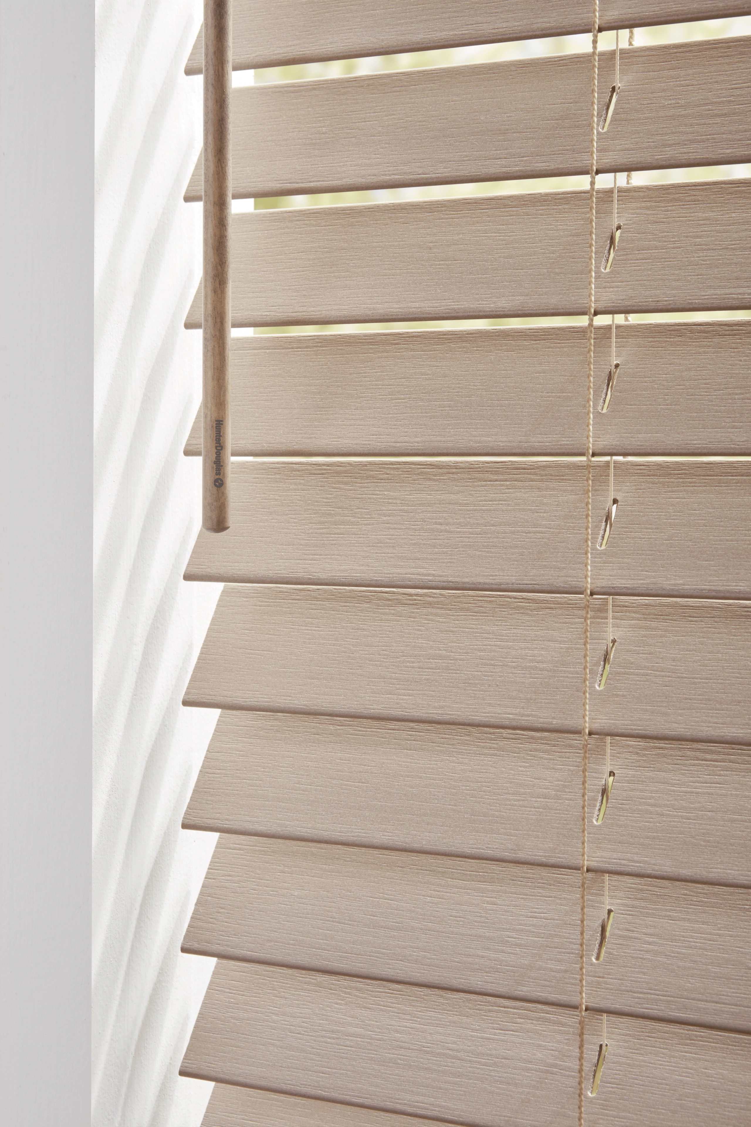 Hunter Douglas EverWood® Alternative Wood Blinds at the window.
