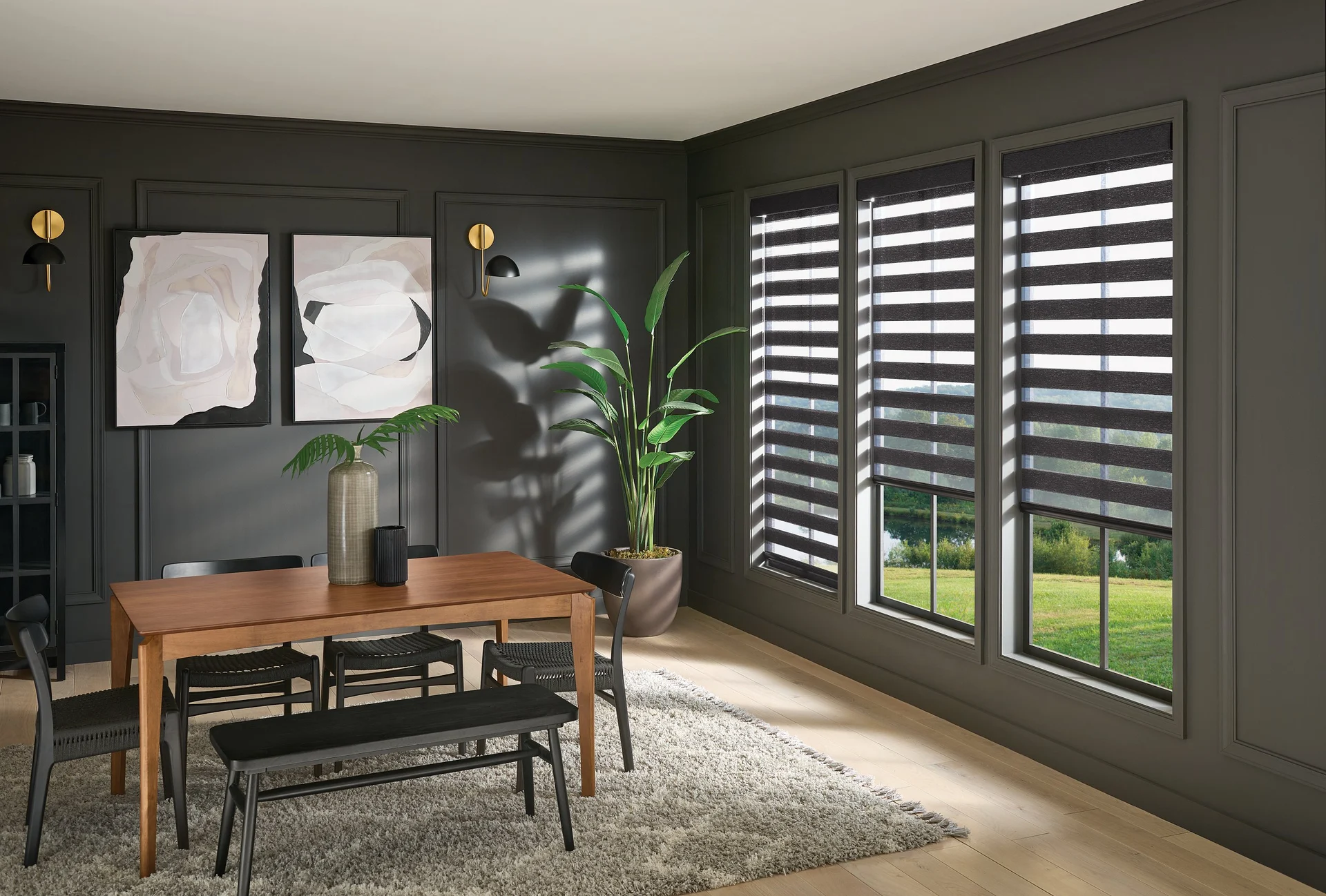 Graber layered zebra shades in a dining room.