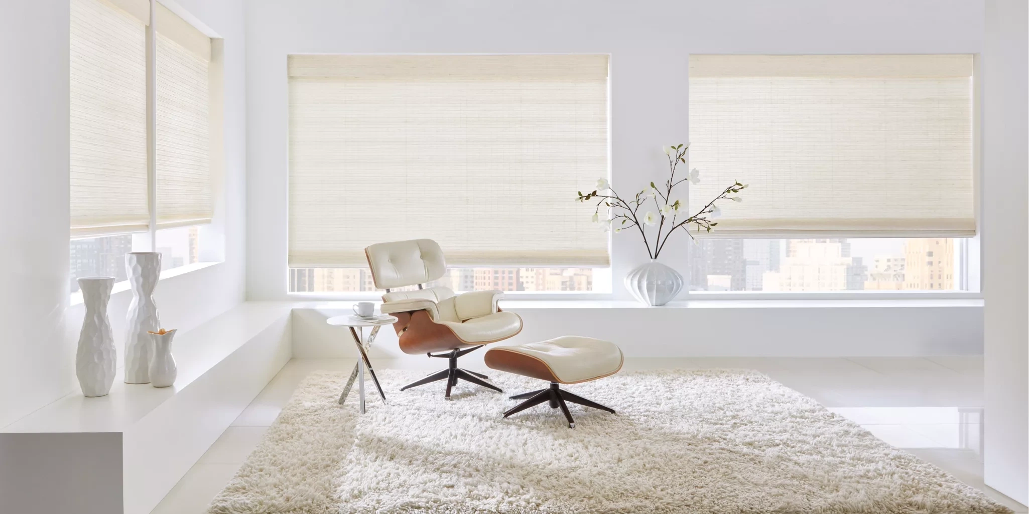 Hunter Douglas Provenance® Woven Wood Shades at the window.