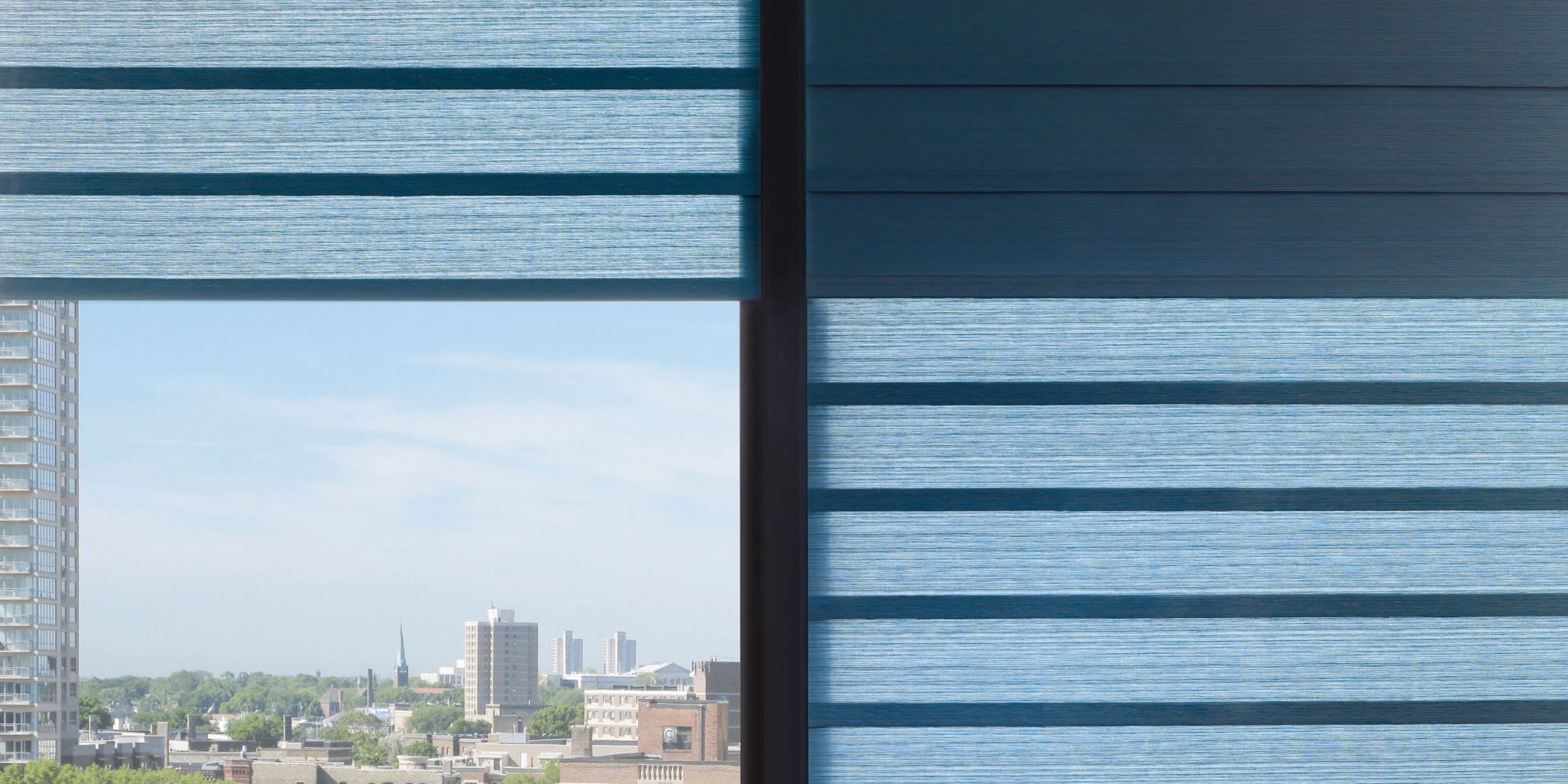 Hunter Douglas Vignette® Modern Roman Shades at the window.