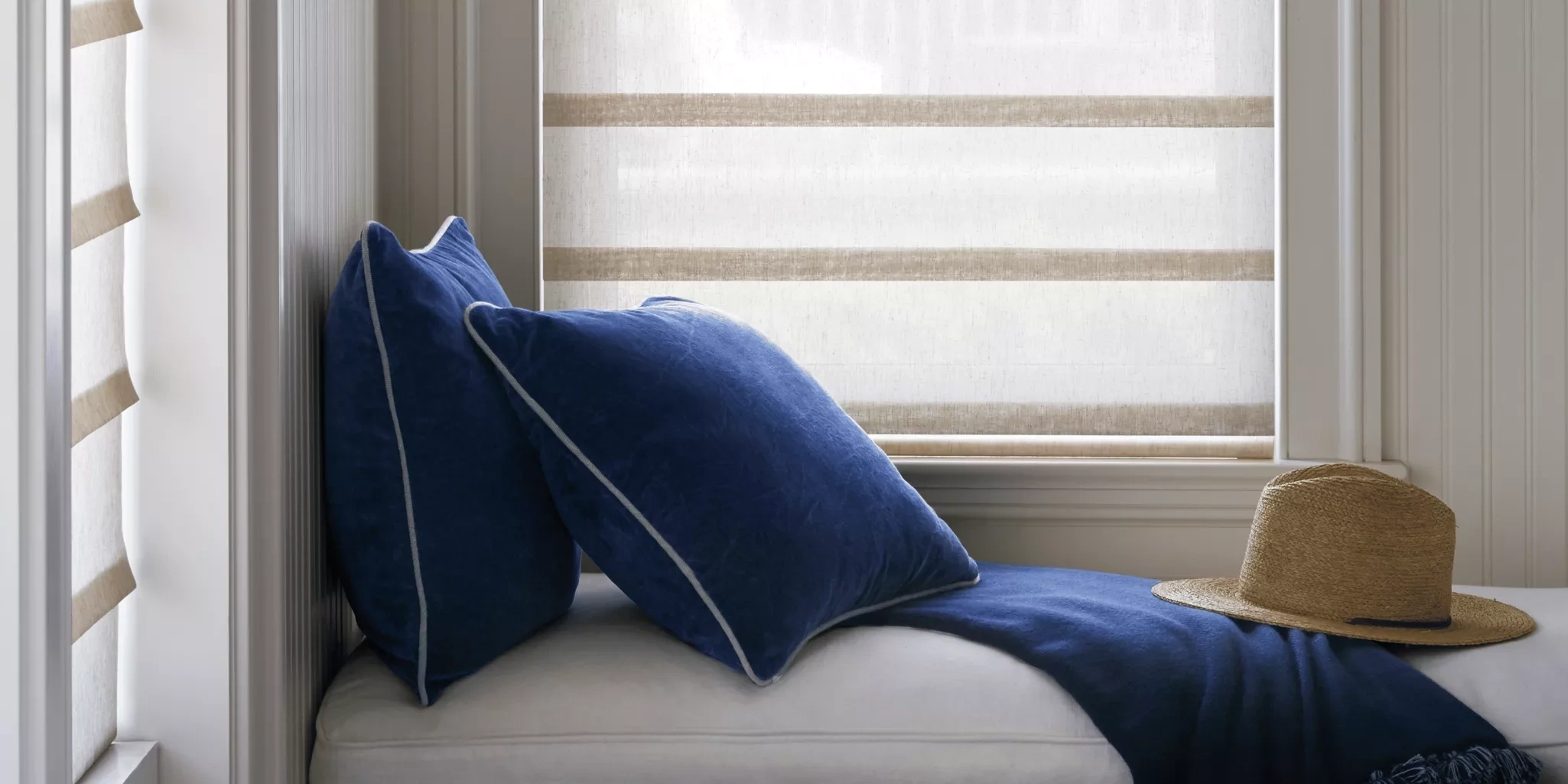 Hunter Douglas Vignette® Modern Roman Shades at the window.